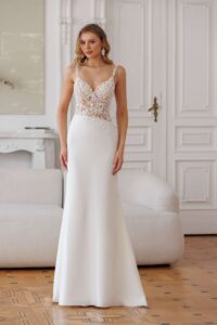 Fit & flare trouwjurk Darling Jarice met transparant kanten lijfje en asymmetrische taille – Weggemans Bruidsmode Emmen